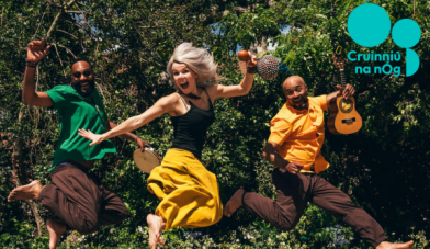 Ta tum tum image of 3 musicians with their instruments jumping into the air