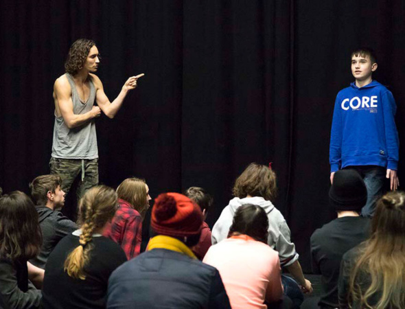 Actor Robert Sheehan with Laois Youth Theatre banner