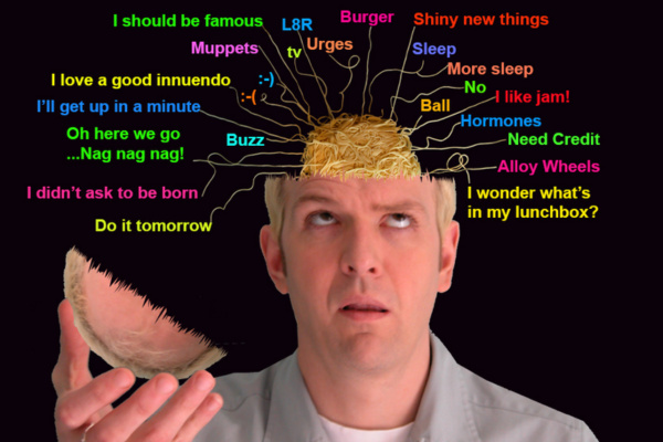 Image of Ger Carey lifting off the top of his head to reveal a brain made of spaghetti with teenage thoughts